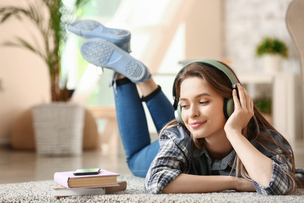 girl listening to bcba exam audiobook